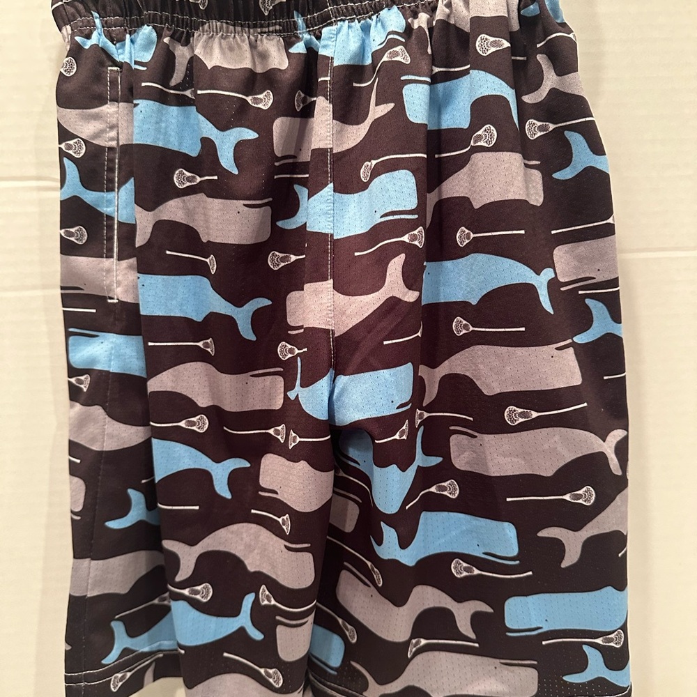 Whale Patterned Lacrosse Unlimited Shorts in Black and Blue